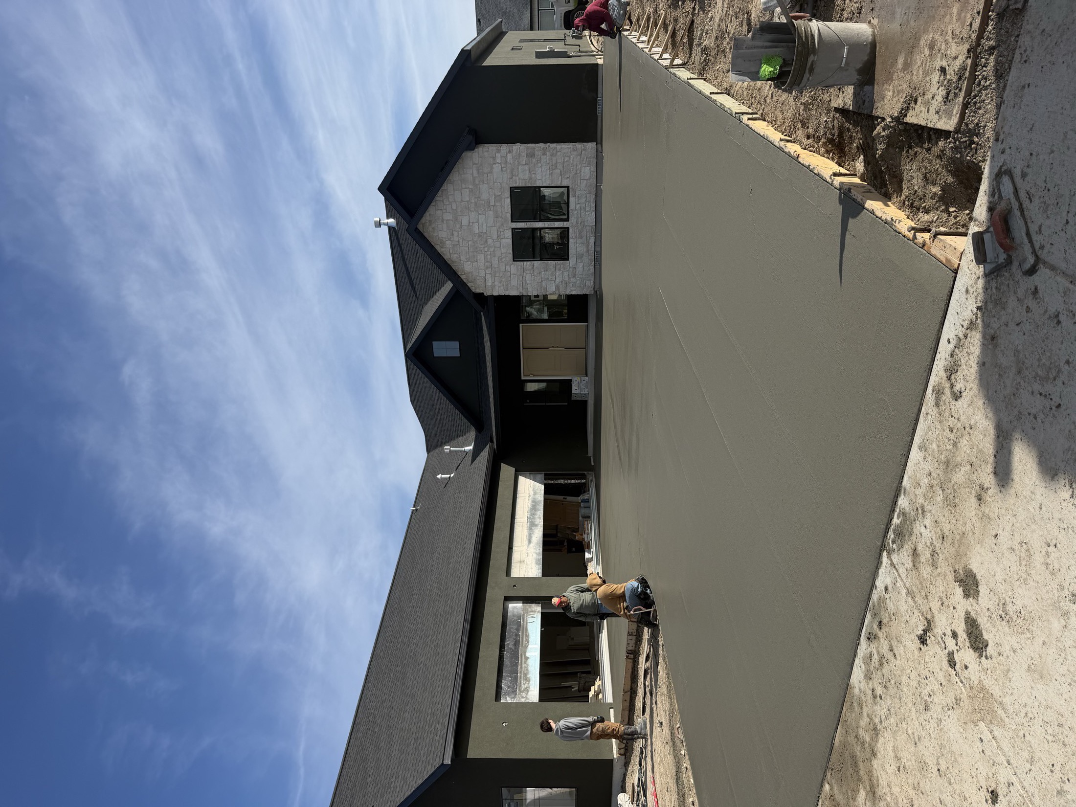 Custom Skyline home in the construction phase, fresh framing and concrete